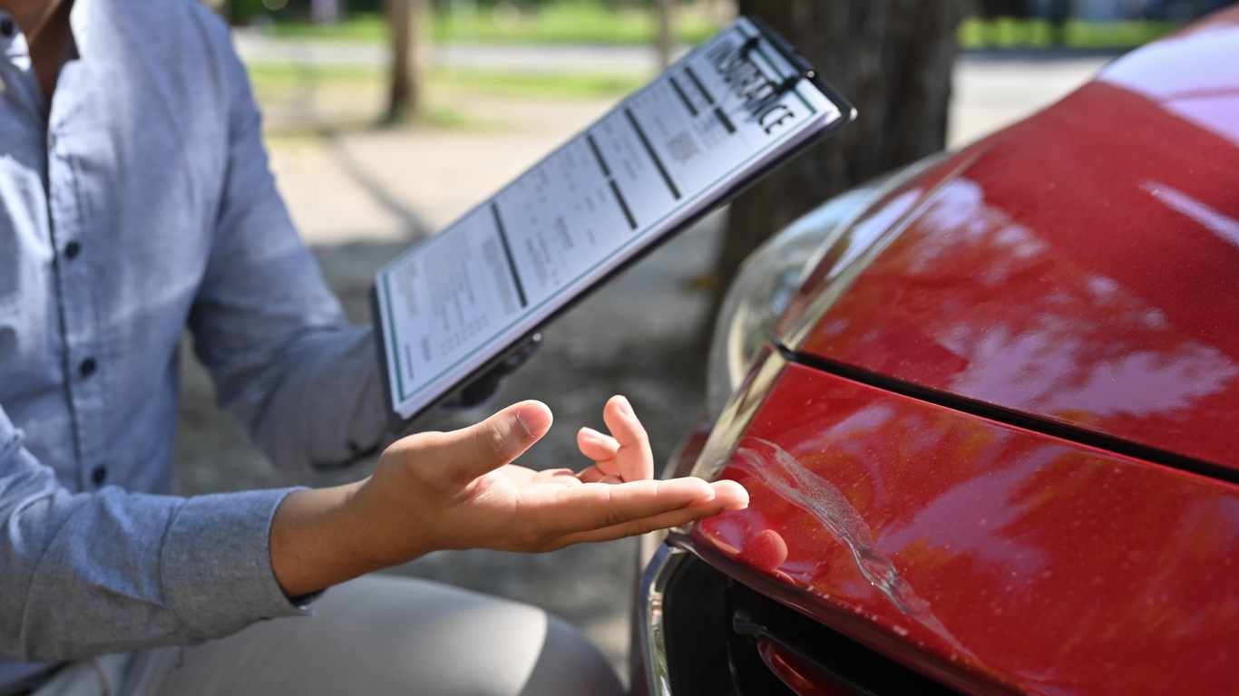 Why Insurance Companies Offer Lowball Settlements After a Car Accident